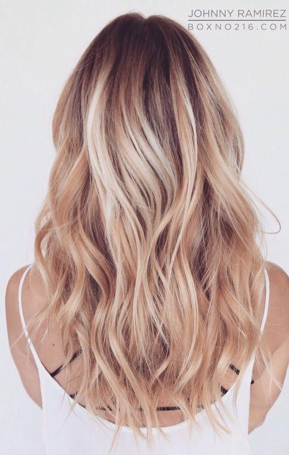 Layered blonde hairstyle for medium and long hair