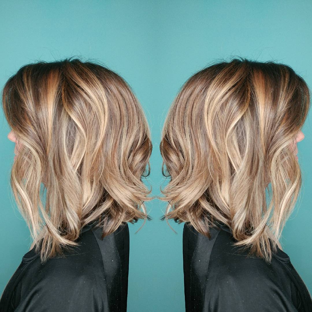 Lose curls with blonde graduated bob hairstyle
